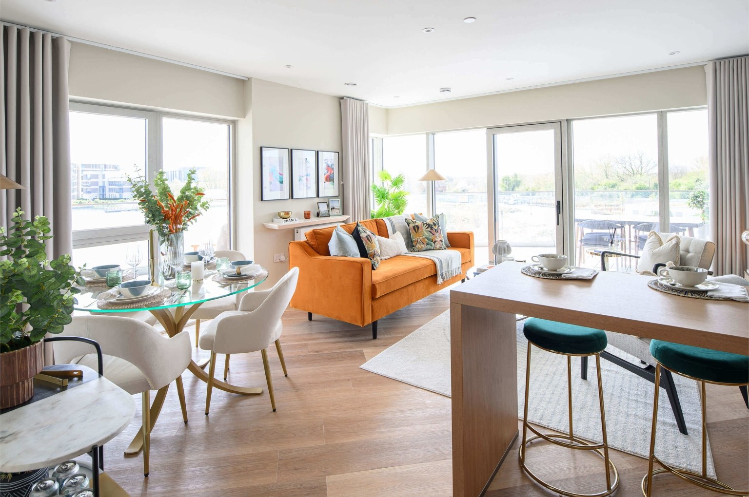 A living room and garden view inside a home at Bankside Gardens