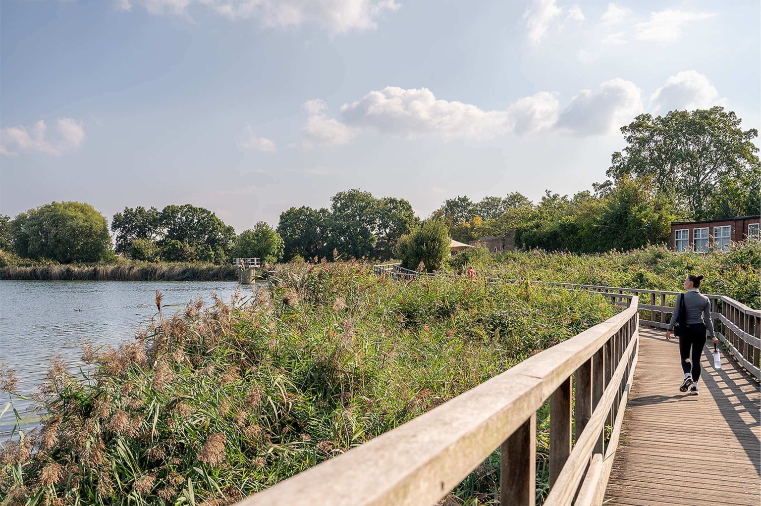 Landscaped communal areas and waterside living at Woodberry Down