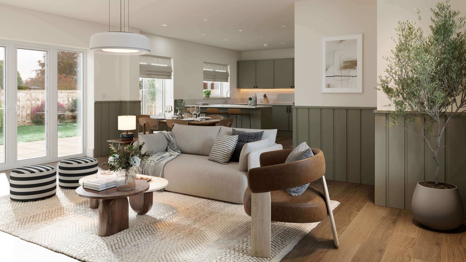 Open plan living room and kitchen inside a home at Foal Hurst Green