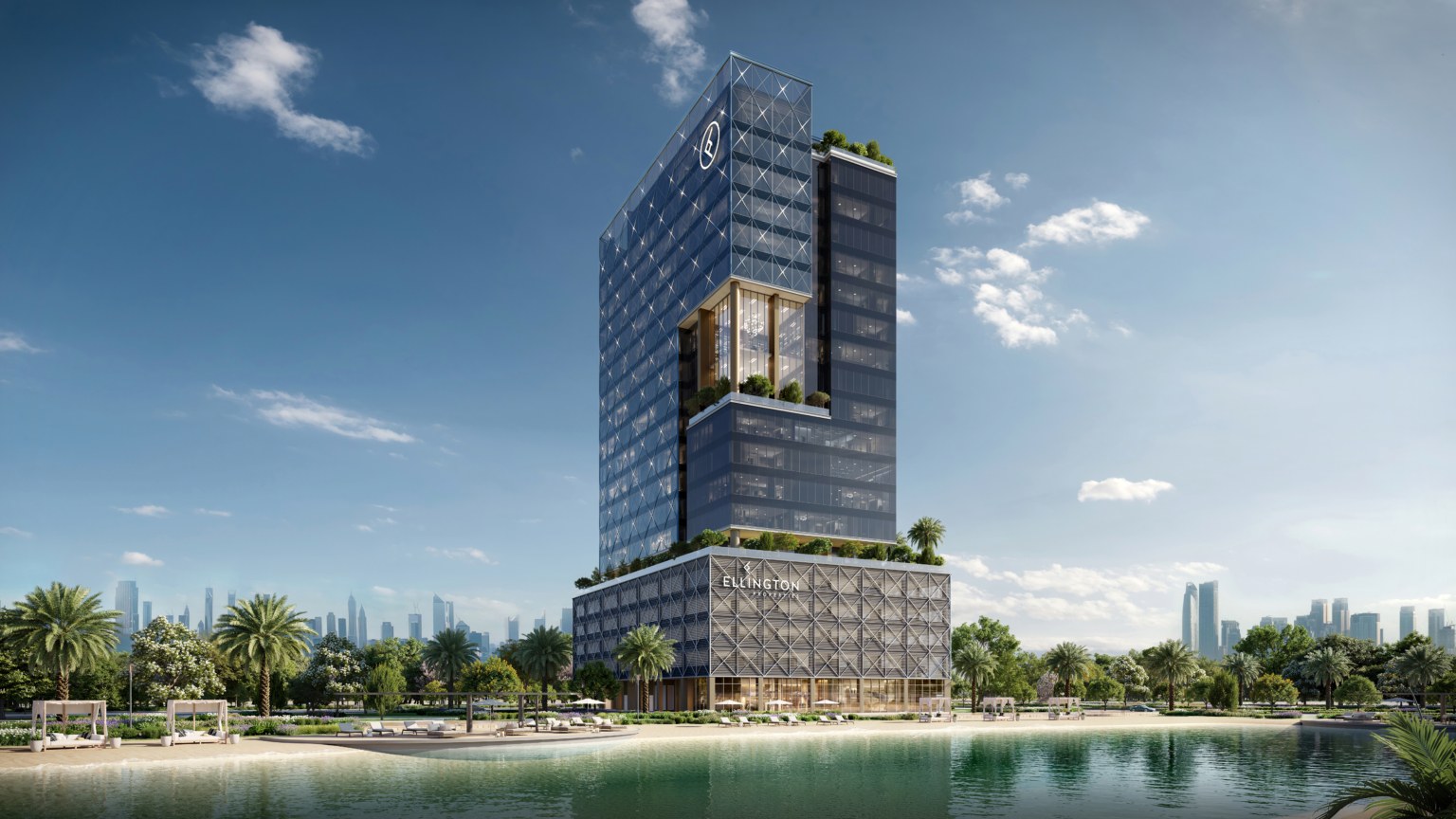 The dark glass tower by the lagoon and man made beach at EATON SQUARE by Ellington
