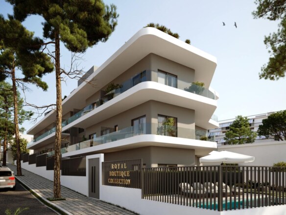 Royal Boutique Collection binasının ağaçlar arasındaki sokak cephesi